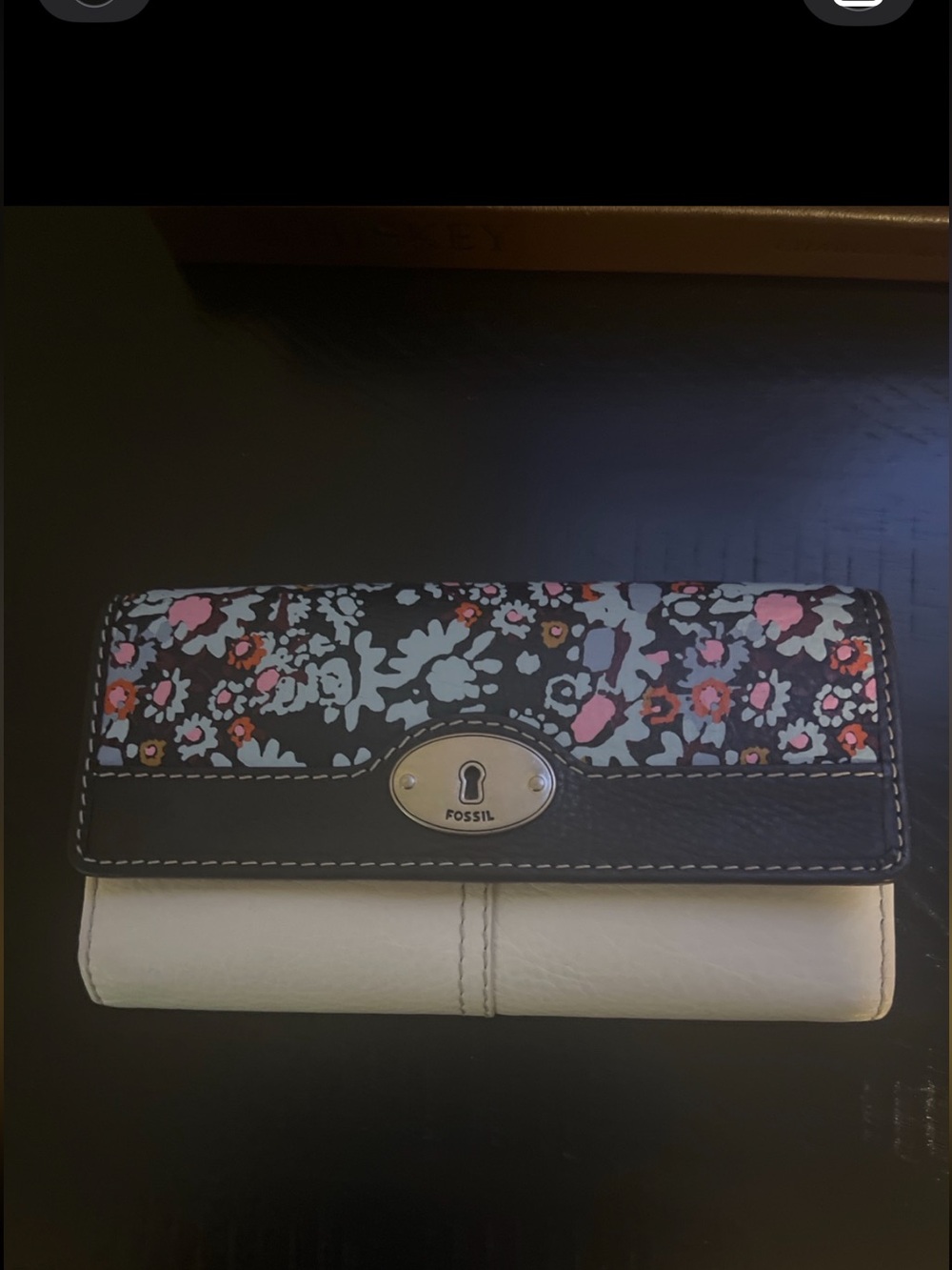 Fossil floral and Key-Per style wallets,